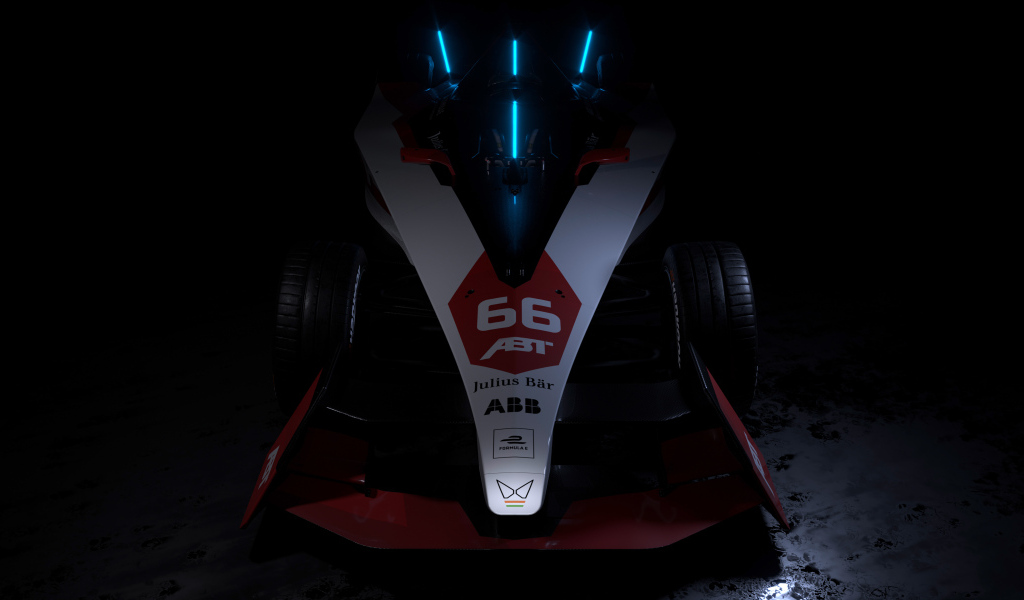 Гоночный автомобиль ABT Sportsline Mahindra M9Electro 2022 на черном фоне