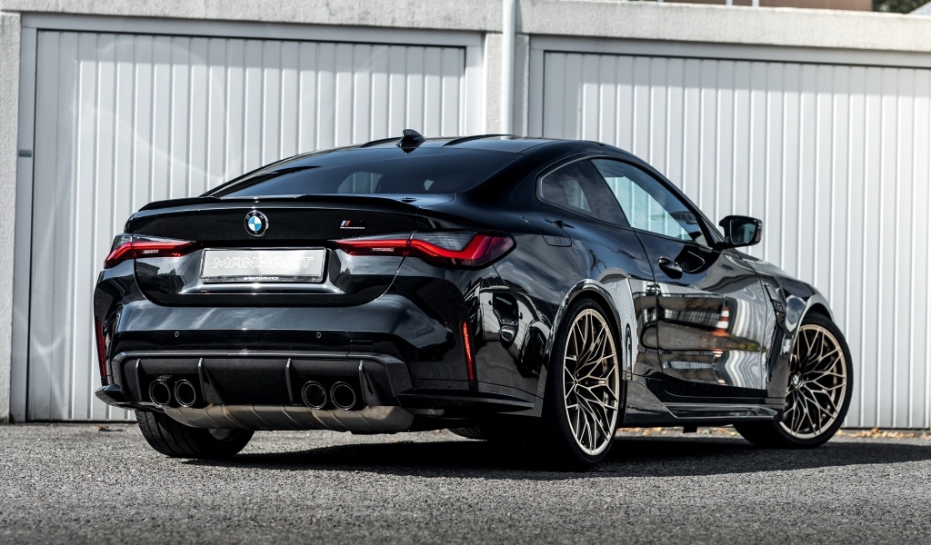 Черный автомобиль Manhart MH4 600 вид сзади