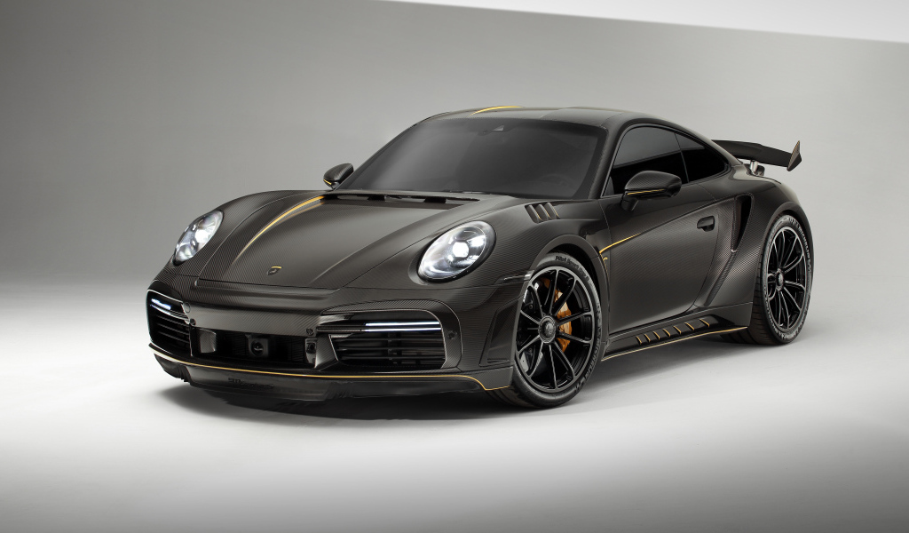 Авто Porsche 911 Turbo S Stinger GTR Carbon Edition на сером фоне 