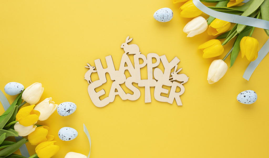 Надпись Счастливой Пасхи на желтом фоне с тюльпанами