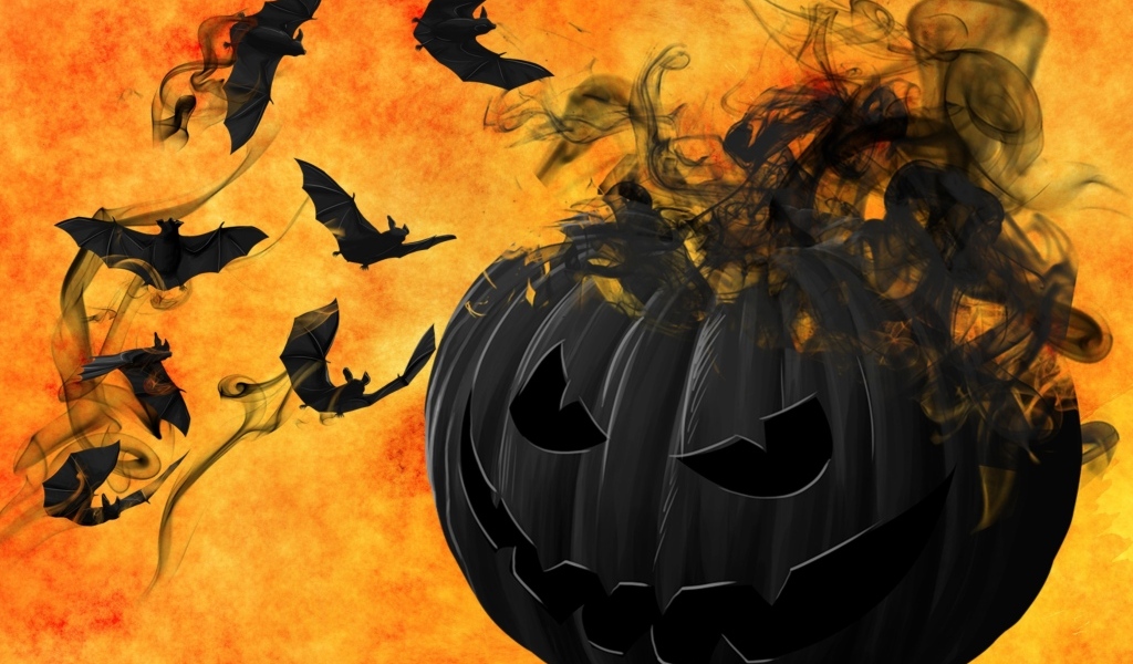 Черные летучие мыши с тыквой на оранжевом фоне