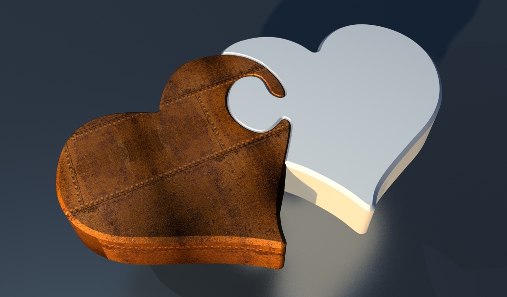 Пазл из двух сердец на сером фоне