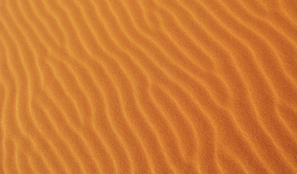 Волнистый горячий песок пустыни крупным планом