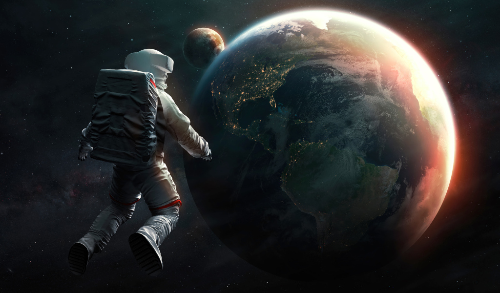 Астронавт смотрит на планету Земля из космоса