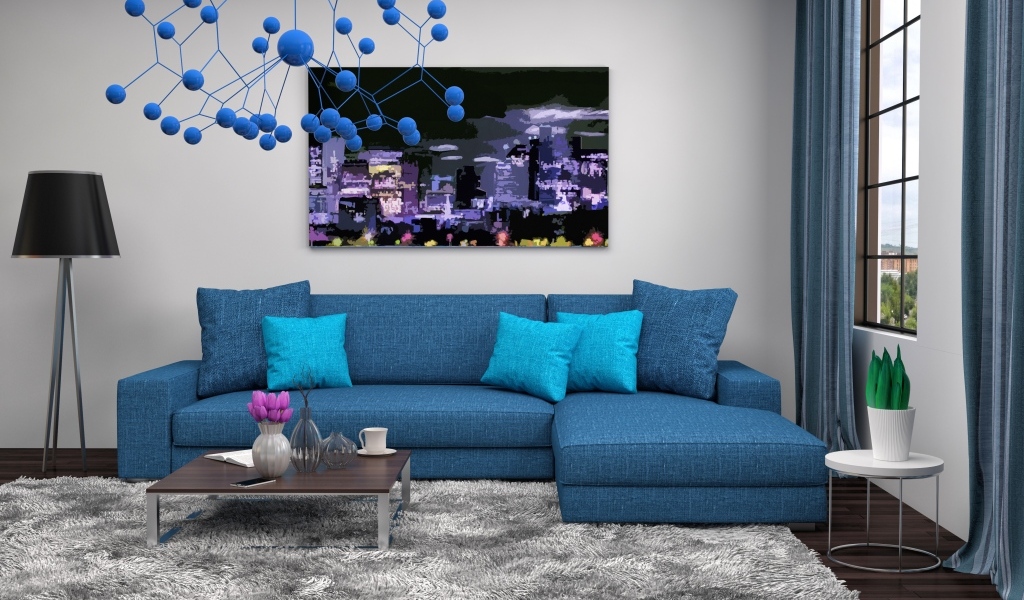 Большой синий диван в комнате в стиле модерн