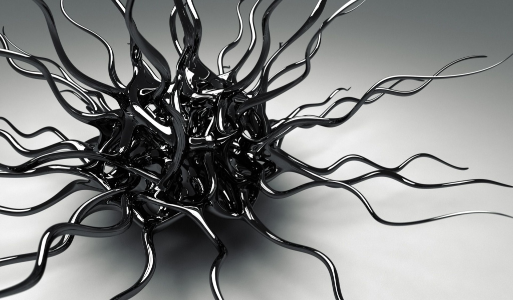 Черный металлический сплав на сером фоне