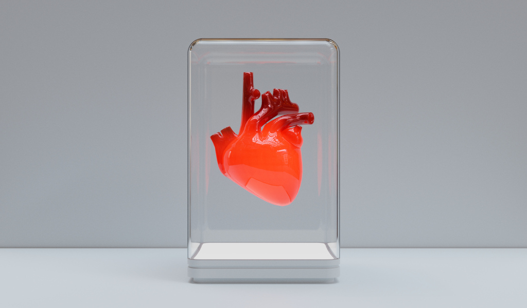 Красное 3д сердце в стеклянной колбе на сером фоне