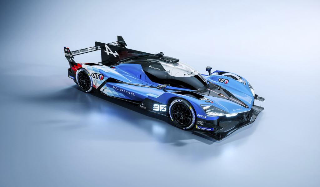 Дорогой быстрый автомобиль Alpine A424 2024 года на сером фоне