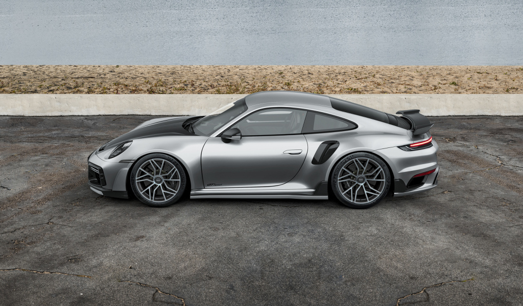 Вид сбоку на серебристый автомобиль TechArt GTsport 2024 года