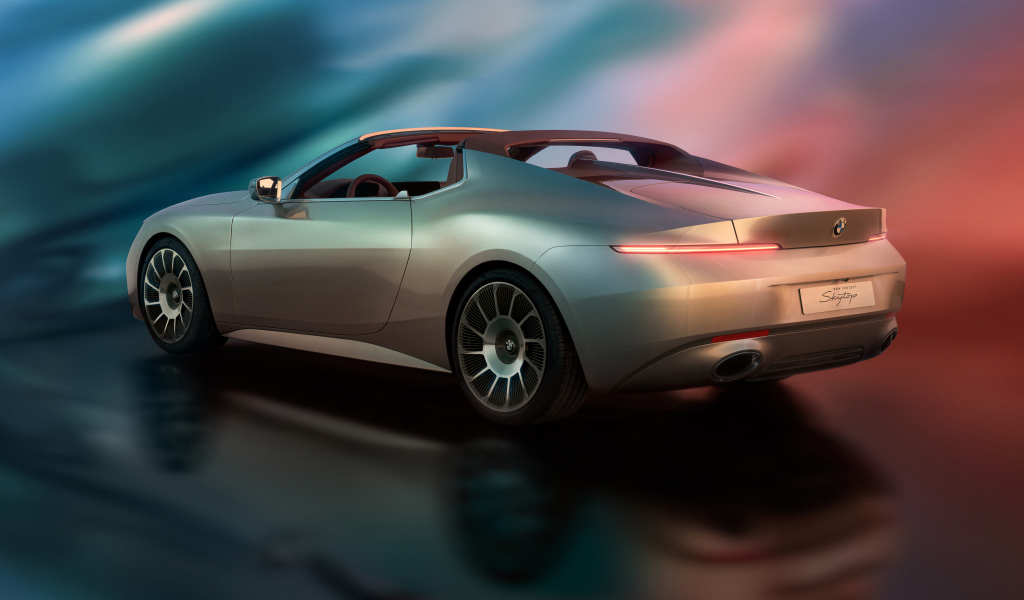 Вид сбоку на автомобиль  BMW Concept Skytop 2024