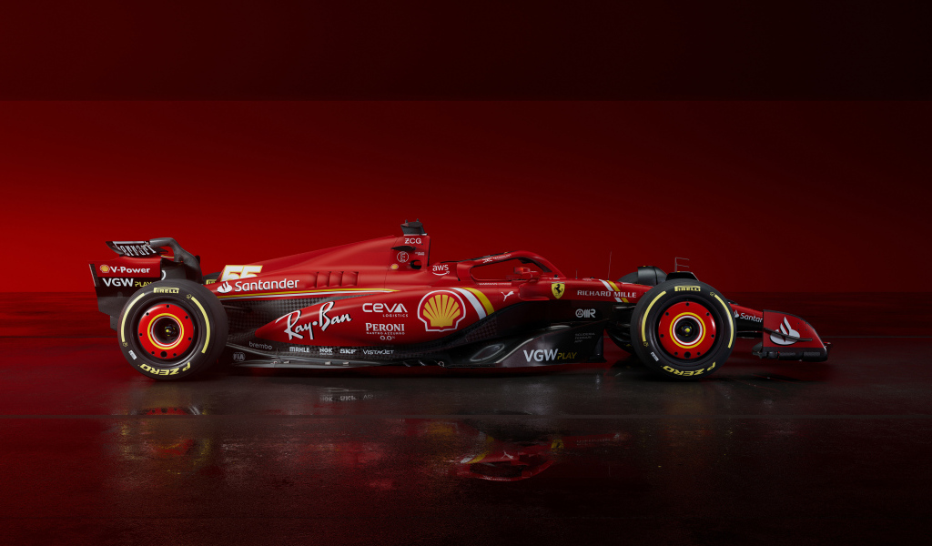 Красный гоночный автомобиль Ferrari SF-24 2024 года вид сбоку