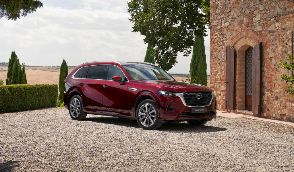 Бордовый автомобиль  Mazda CX-80 E-Skyactiv PHEV AWD 2024 года