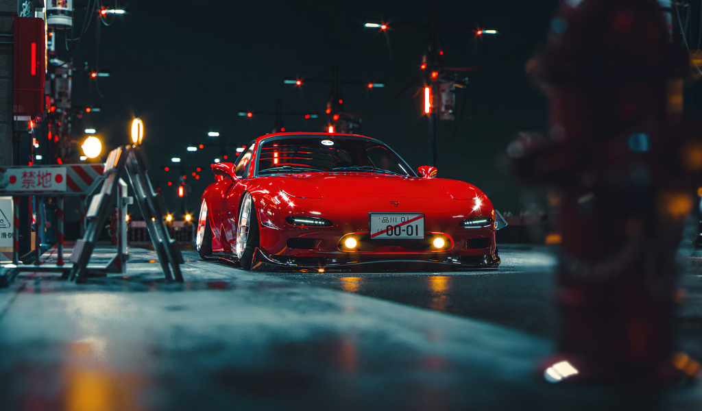 Красный автомобиль Mazda RX-7 Retro