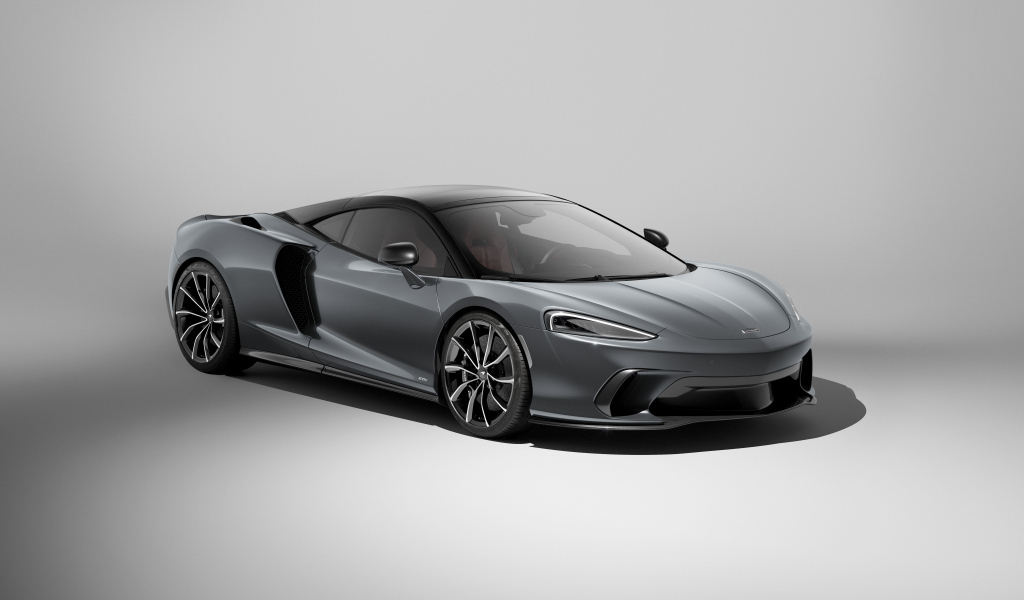 Серый автомобиль McLaren GTS