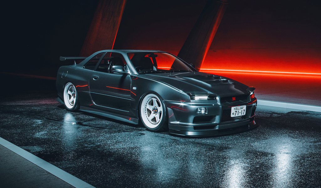 Черный автомобиль Nissan Skyline GTR R34