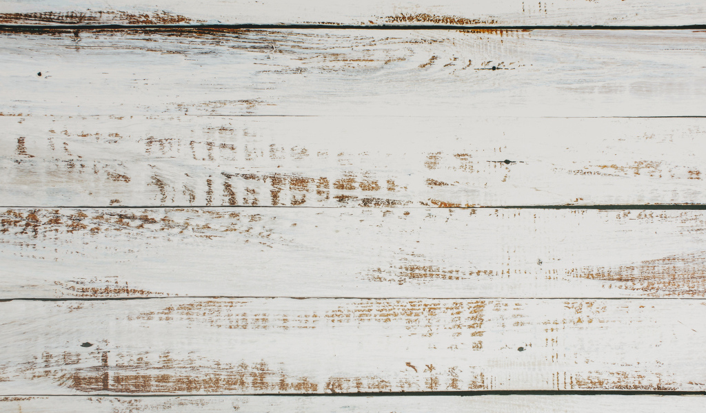 Окрашенная белой краской деревянная поверхность