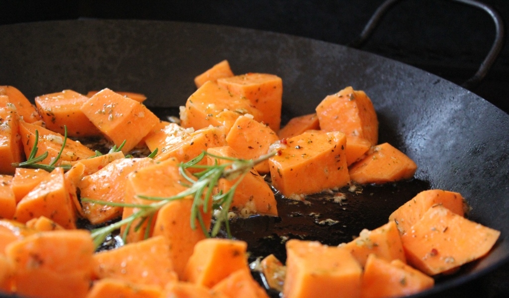 Carrots in a pan with rosemary