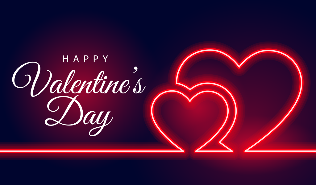 Два красных неоновых сердца на день святого Валентина