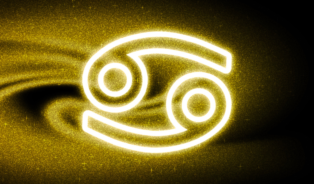 Золотистая пыль со знаком зодиака рак на черном фоне