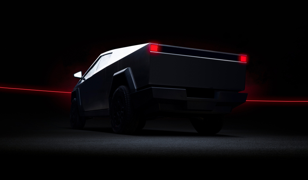 Вид сзади на автомобиль Tesla Cybertruck Dark