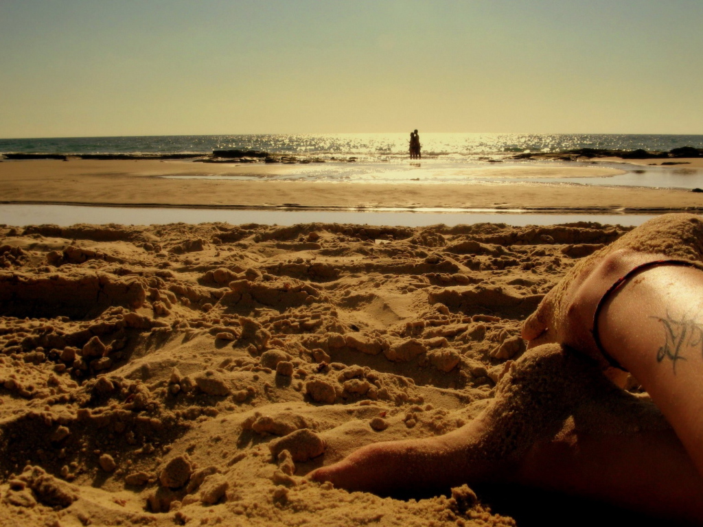 Ножки в песке