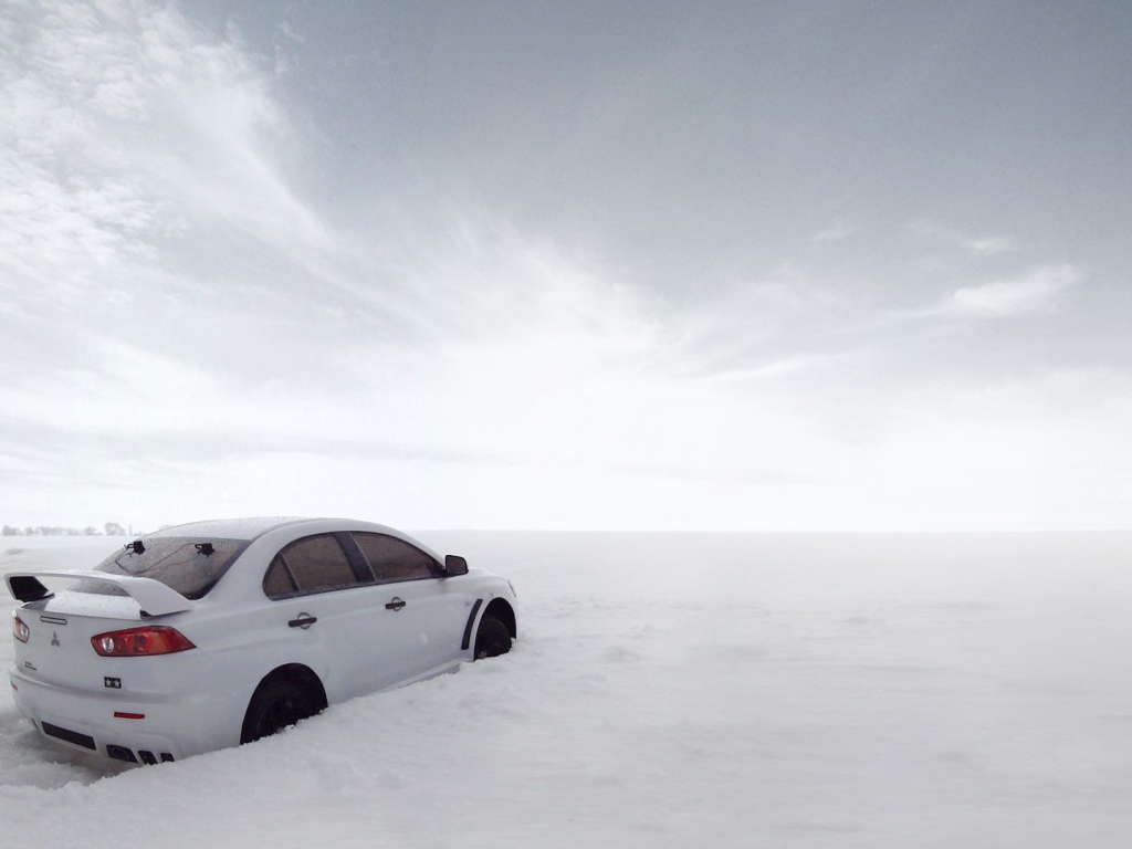 Митсубиси Evo X в снегу
