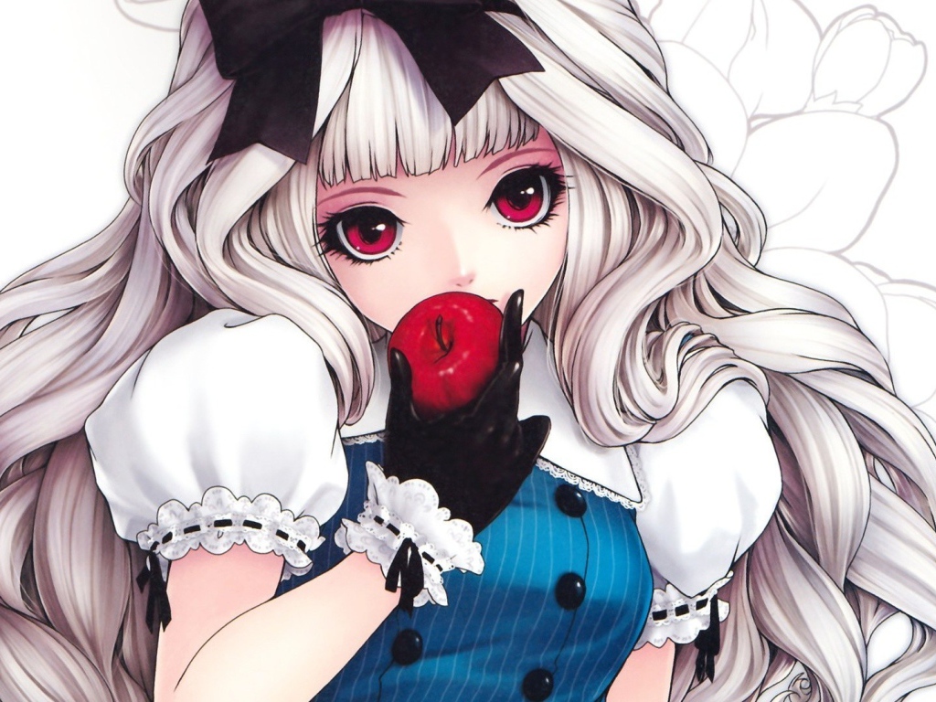 Девочка откусывает яблоко