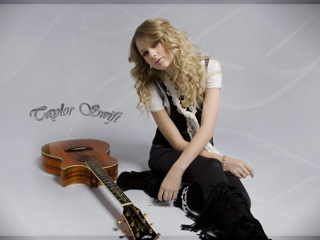 Тейлор с гитарой