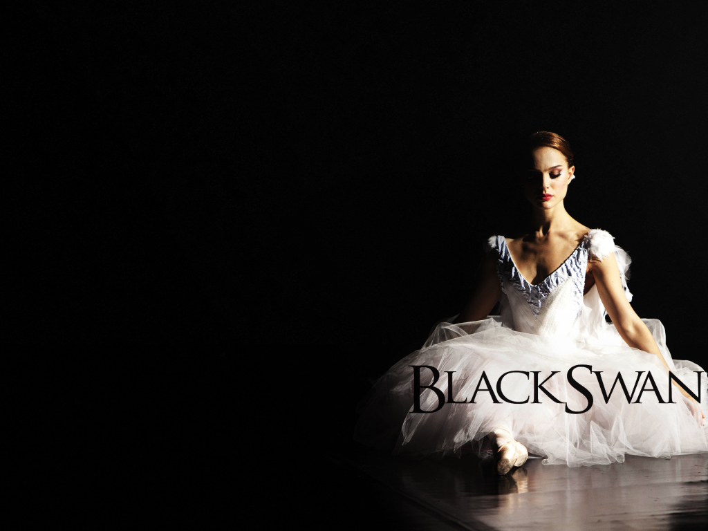 Балерина в образе белого лебедя