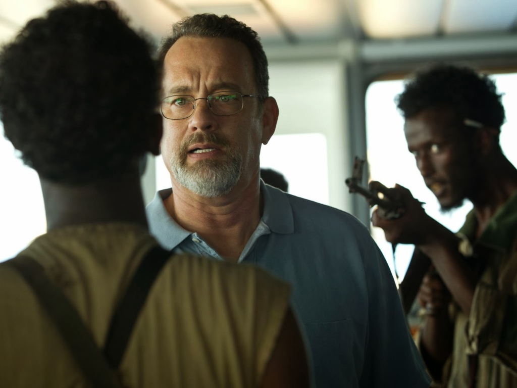 Капитан Филлипс главны герой говорит с пиратами