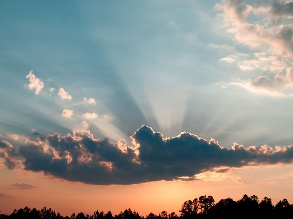 Лучи солнца из облака