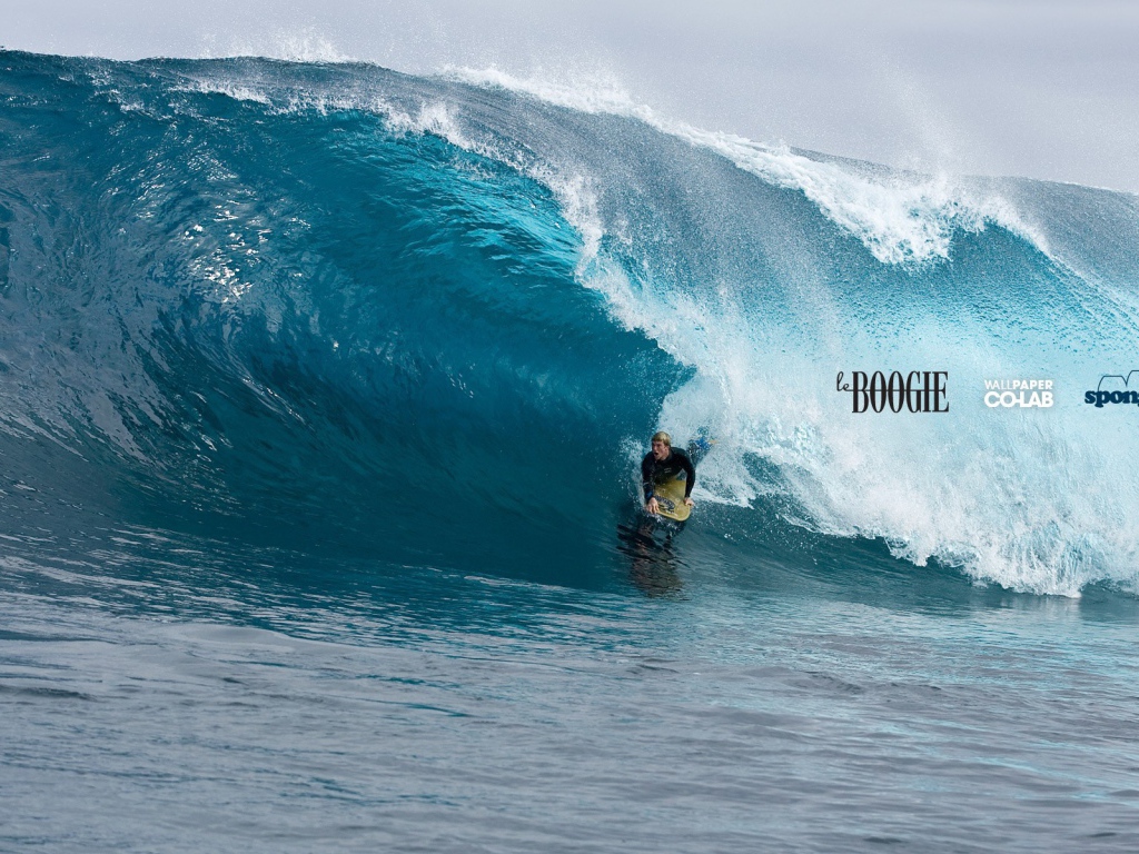 Катание на доске по волне