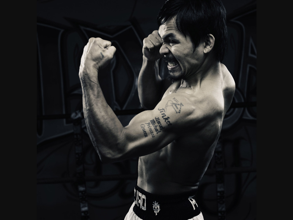 Фотография боксера во время апперкота