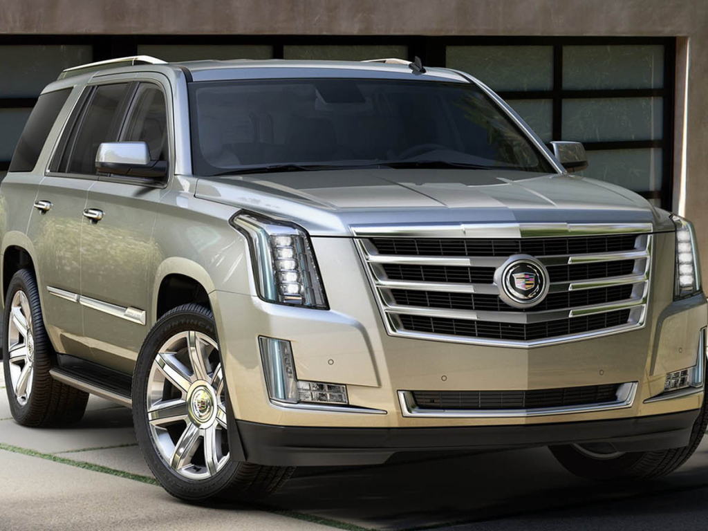 Золотистый Cadillac Escalade 2014