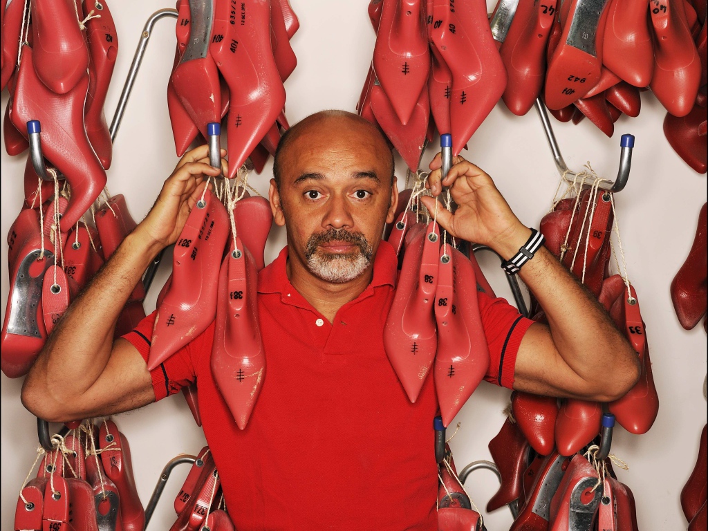 Известный модельер Christian Louboutin