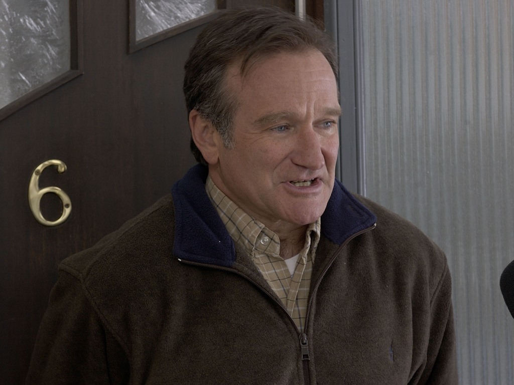 Актер Робин Уильямс у двери