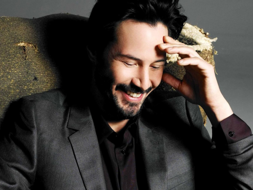 Киану Ривз смеется