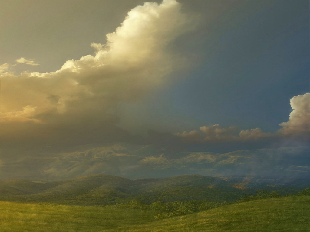 Облака над холмами