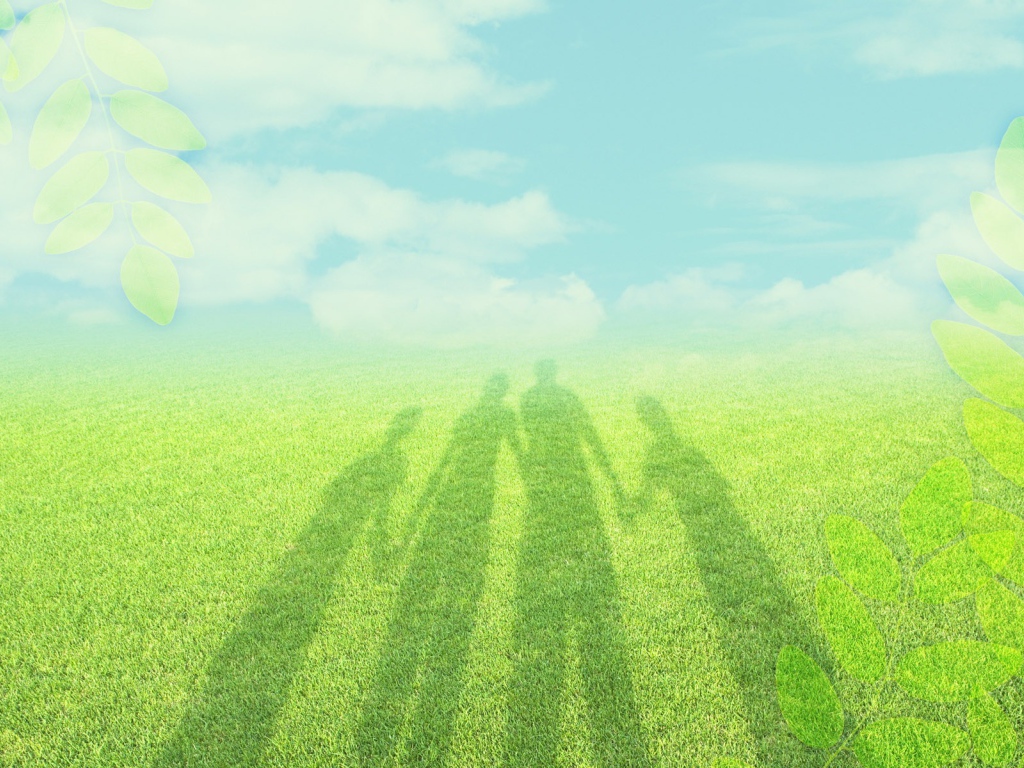 Тень семьи на траве