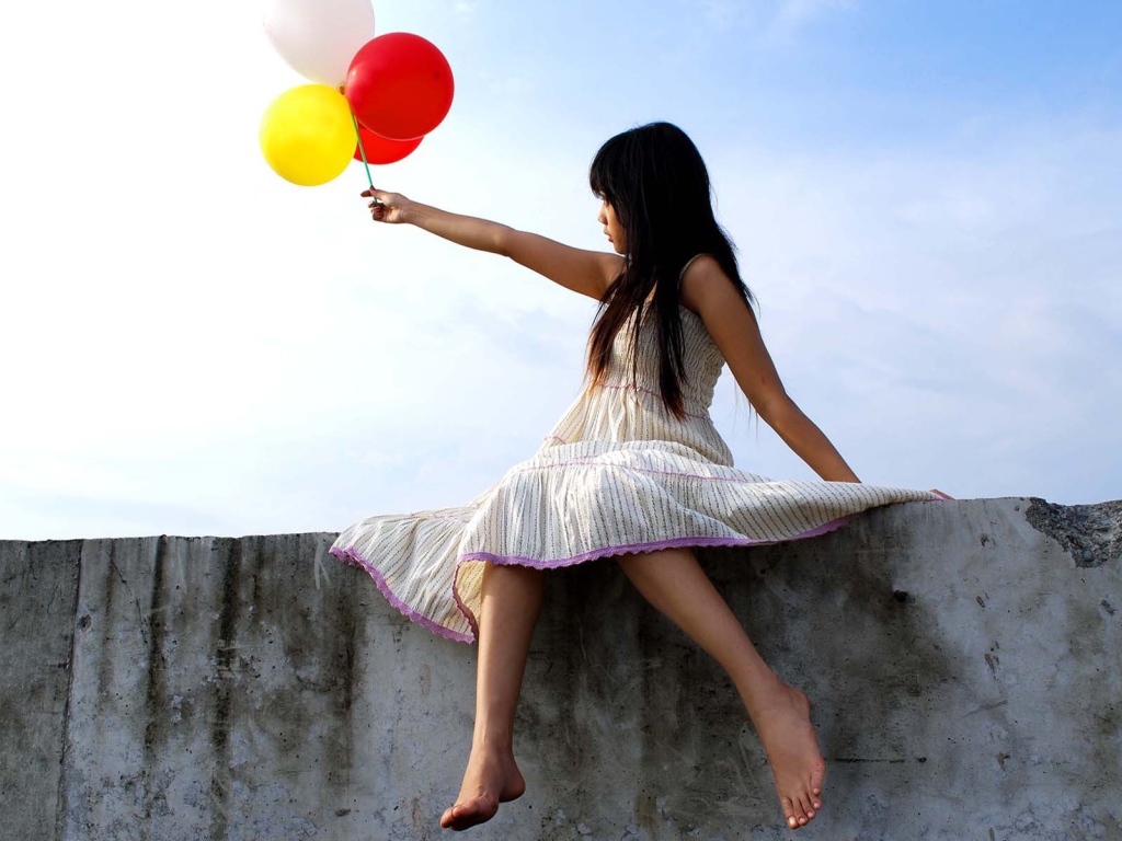 Девочка с воздушными шарами