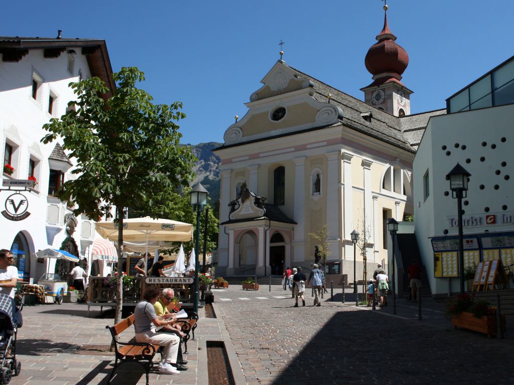 Church on the square in Ortisei, Italy