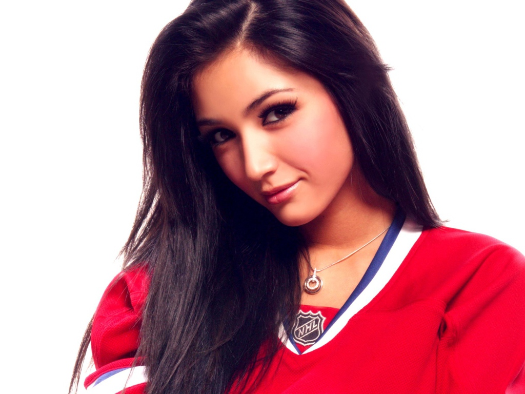 Женщина хоккеист