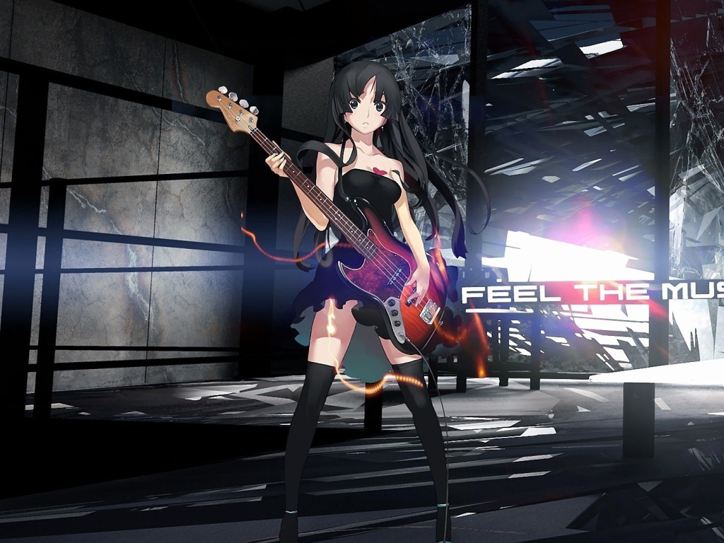 Девушка аниме Akiyama Mio с гитарой