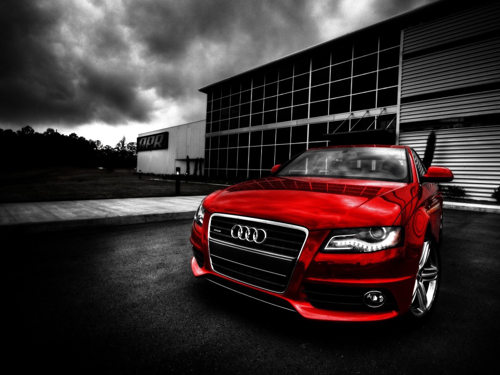 Красный Ауди на темном фоне