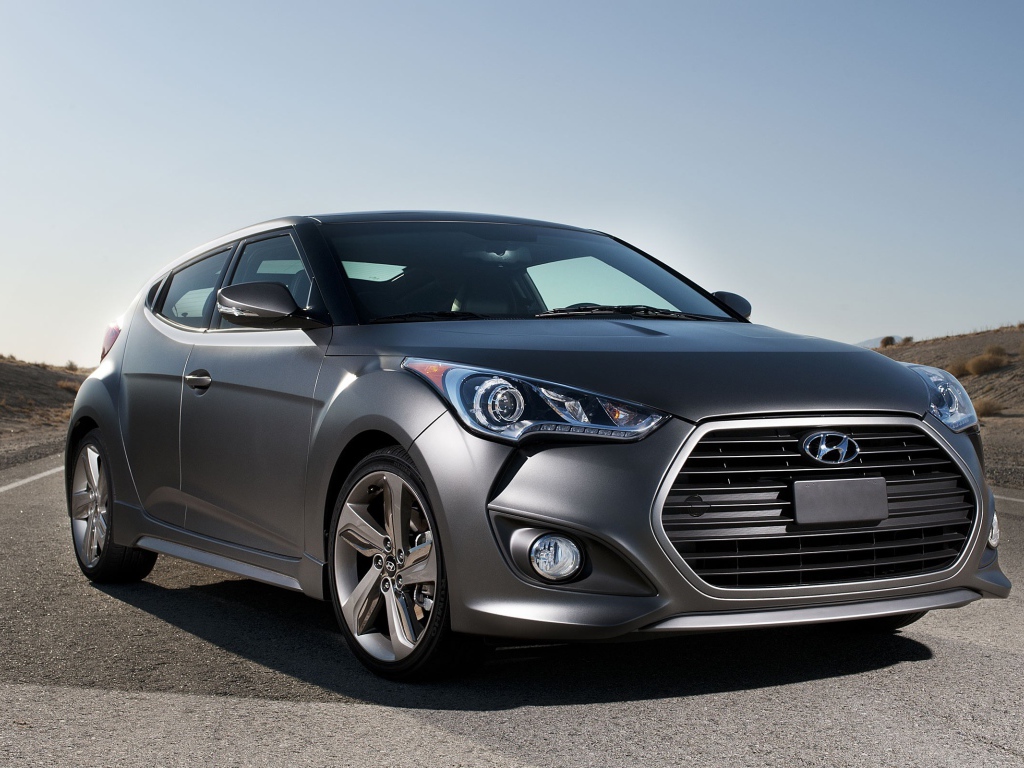Car Hyundai Veloster on the highway