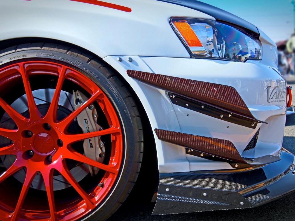 Оранжевый диск автомобиля Mitsubishi Lancer Evo X