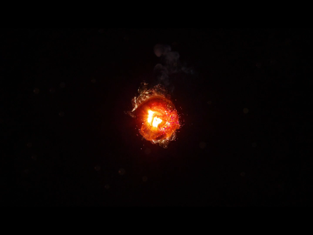 Горящий уголек, черный фон