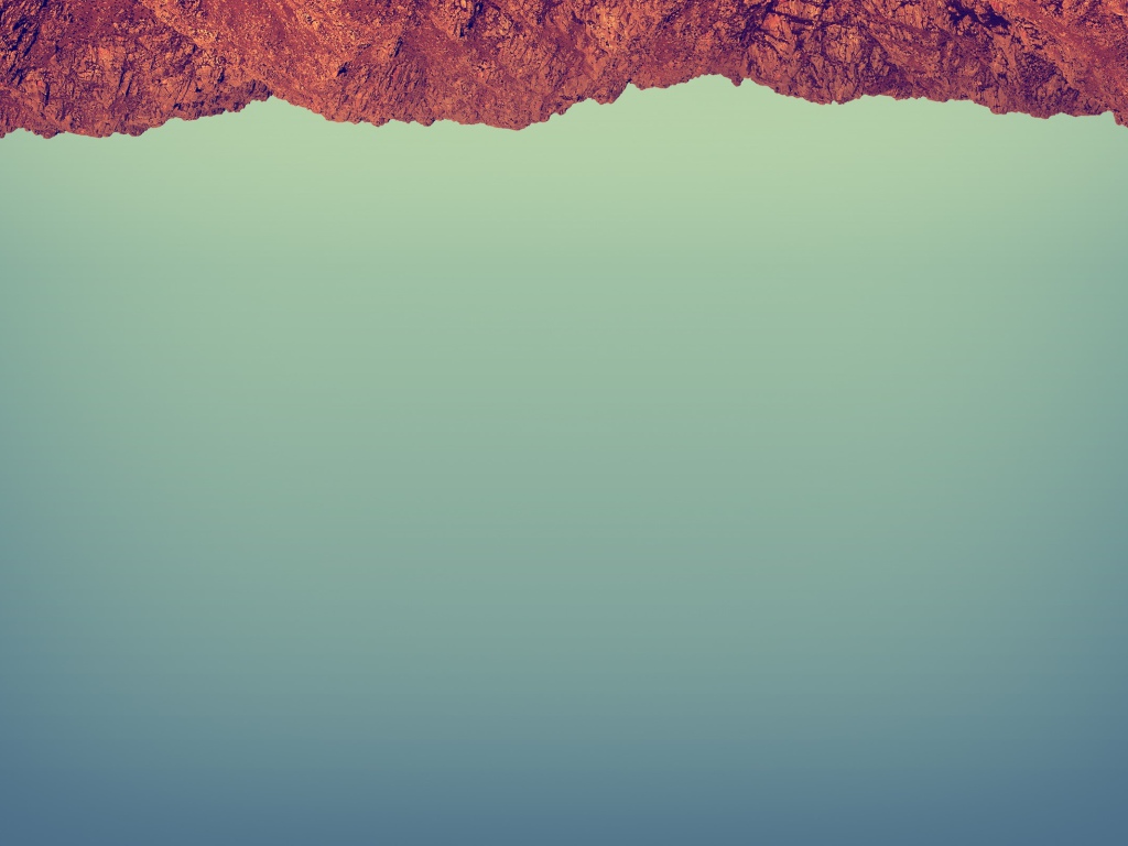 Красный камень на сером фоне