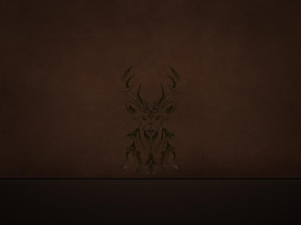 Силуэт оленя на коричневой коже