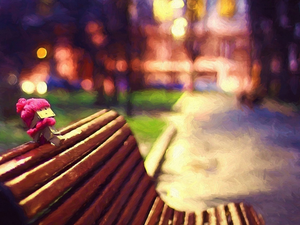 Человечек из картона на скамье